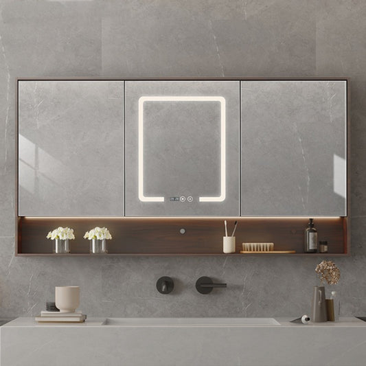 Bathroom with a large mirror above a sink, featuring modern fixtures and decor.